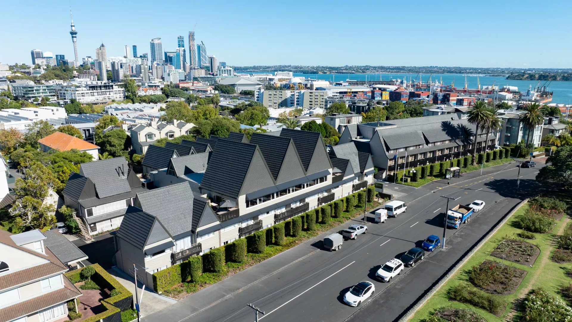 Aerial view of Rose Park Hotel Auckland, a boutique accommodation in Auckland, with views of Spark Arena, the harbour and CBD in the background.