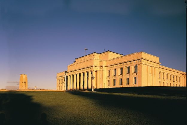 Auckland War Memorial Museum at dusk, one of Auckland's most iconic landmarks located in the Auckland Domain near Parnell and